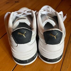 Puma White and Black Sneakers with Gold Logo